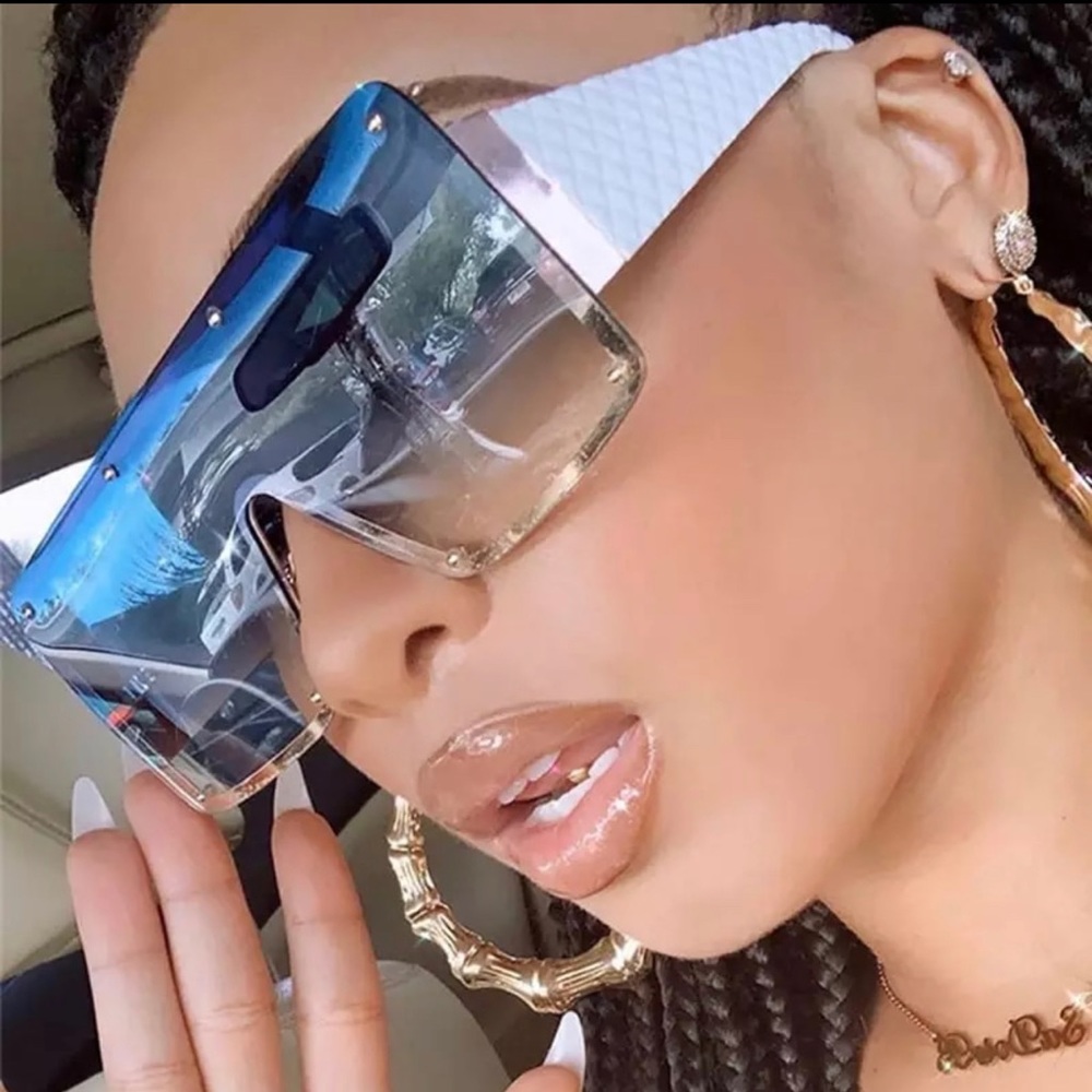 - Oversized sunglasses